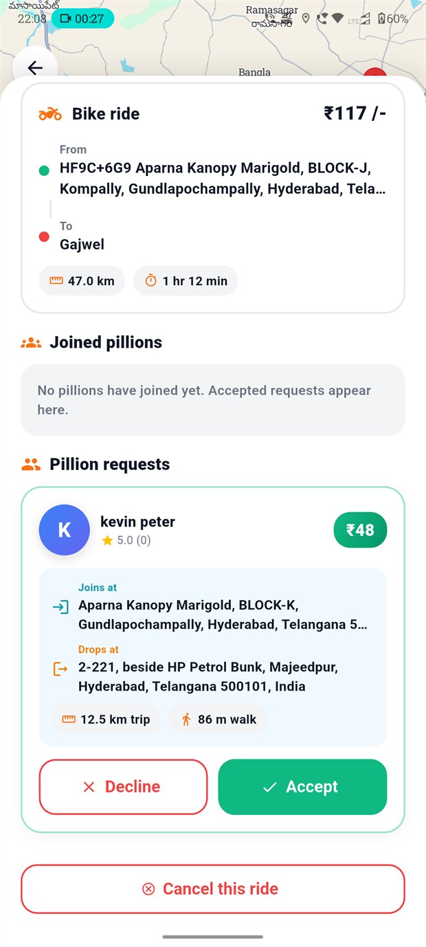 Rider screen listing a pillion request showing where the pillion joins and drops, the trip length, and accept or decline buttons.